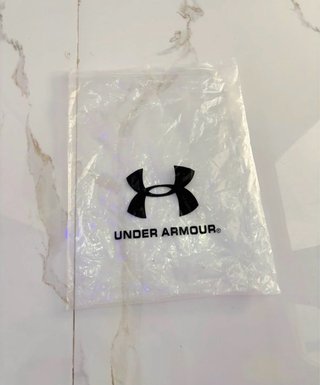 Conjunto deportivo Under Armour gris