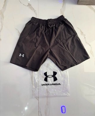 Conjunto deportivo Under Armour gris