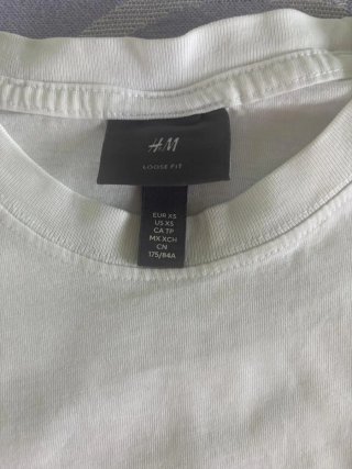 Camiseta blanca con estampado Grow Into