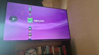 PlayStation 3 con mandos y juegos