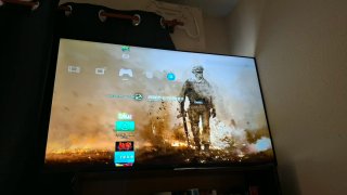 PlayStation 3 con mandos y juegos
