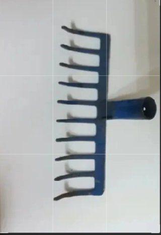 Rastrillo de metal azul
