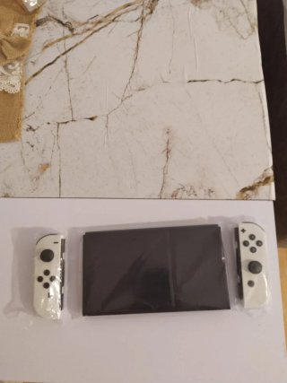 Nintendo Switch OLED Blanca y Negra
