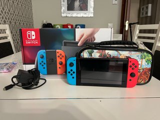Nintendo Switch Rojo y Azul + Accesorios