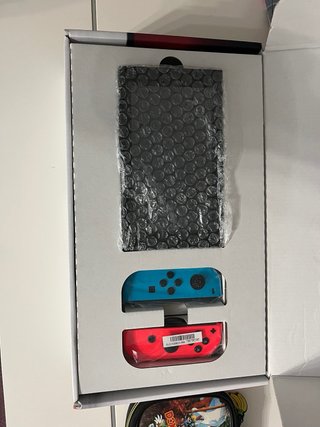 Nintendo Switch Rojo y Azul + Accesorios