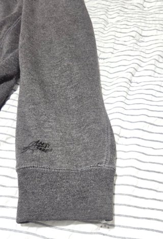 Chaqueta Rip Curl Gris y Negra con Capucha