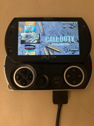 Sony PSP Go Nero + Caricatore e Custodia + 12 giochi