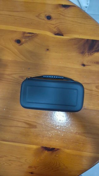 Nintendo Switch OLED + 3 Giochi + Custodia