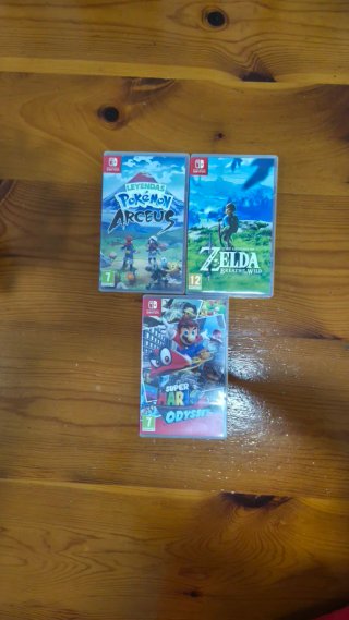 Nintendo Switch OLED + 3 Giochi + Custodia
