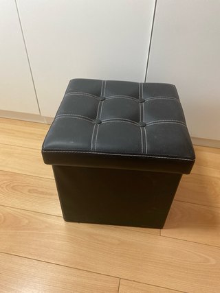 Pouf nero in similpelle con spazio di archiviazione