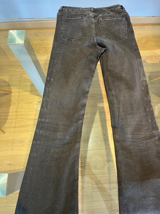 Pantalones campana negros con tachuelas