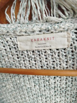 Chaqueta punto Zaraknit con flecos y corte abierto