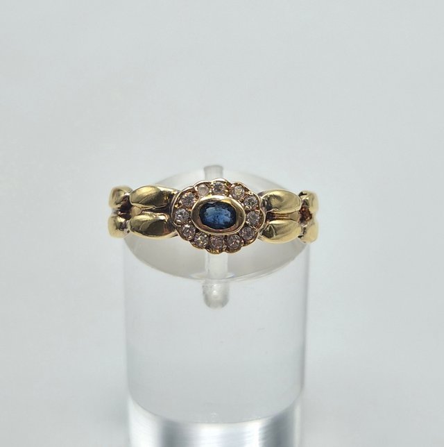 Anillo de oro de 18k con Piedras. 3 gr. T-18