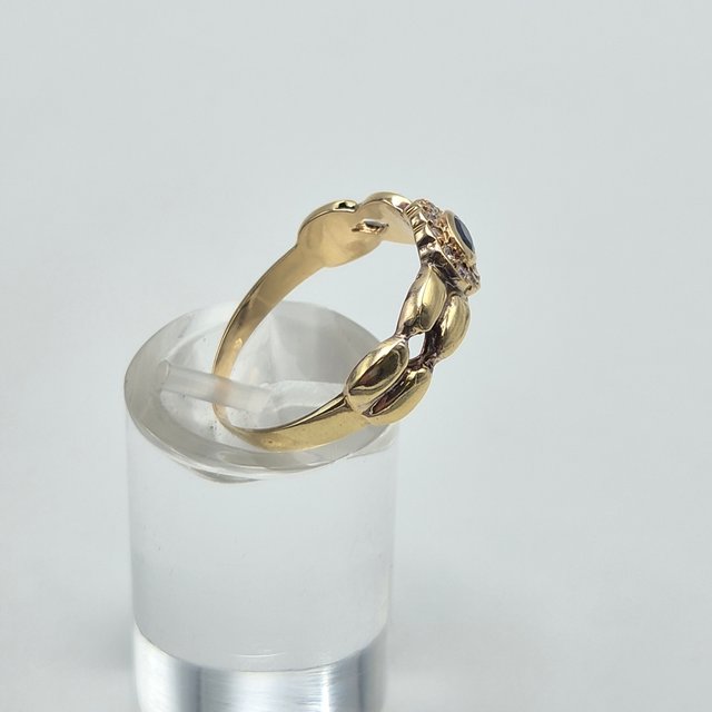 Anillo de oro de 18k con Piedras. 3 gr. T-18