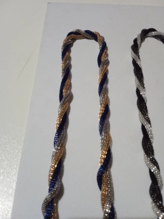 Collana trecciata colore oro, argento, blu, nero
