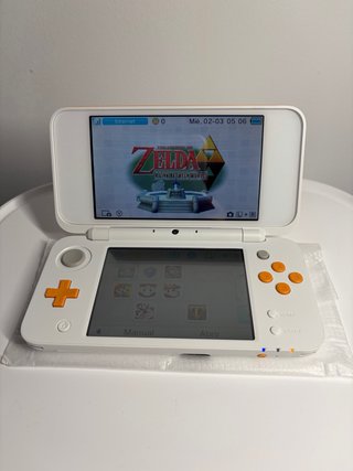 Nuovo Nintendo 2DS LL Arancione/Bianco