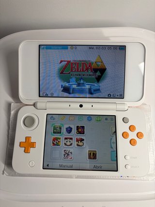 Nuovo Nintendo 2DS LL Arancione/Bianco