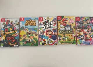 Nintendo Switch V2 + Caja + 4 JoyCon + 5 Juegos