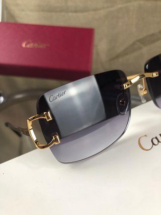 Gafas de Sol Cartier Negras y Doradas – Elegancia