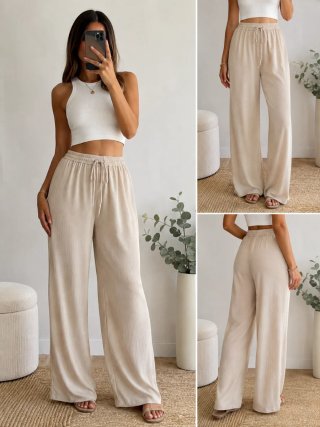 Pantalones palazzo Kiabi beige Talla L