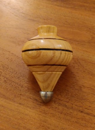 2 Peonzas de madera con punta gruesa
