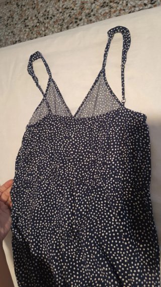 Mono azul marino con lunares blancos