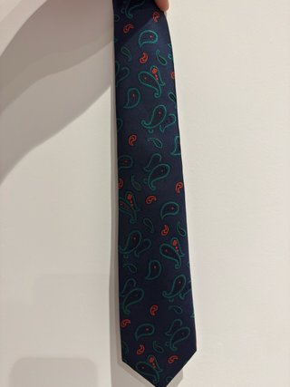 Corbata azul con estampado paisley