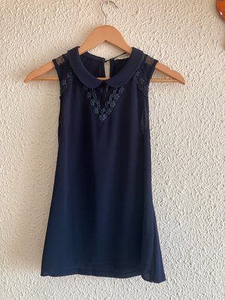 Camiseta azul con cuello Peter Pan