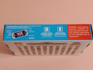 Sega Mega Drive portátil AtGames, 80 juegos, caja