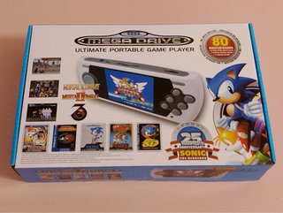 Sega Mega Drive portátil AtGames, 80 juegos, caja