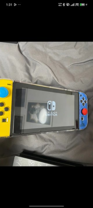 Nintendo Switch Azul/Amarillo + Accesorios