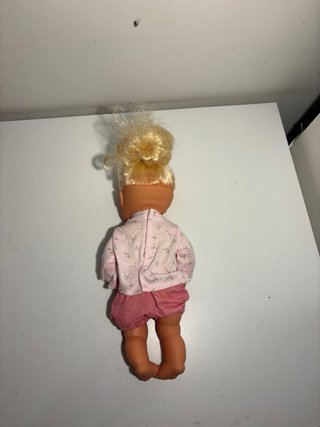 Bambola con vestitino rosa