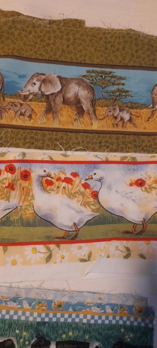 Tessuti a strisce con animali