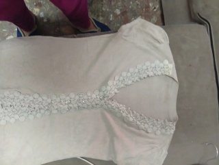 Cárdigan beige con encaje floral