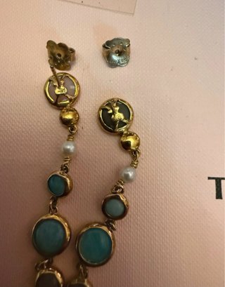 Conjunto Tous oro y turquesa