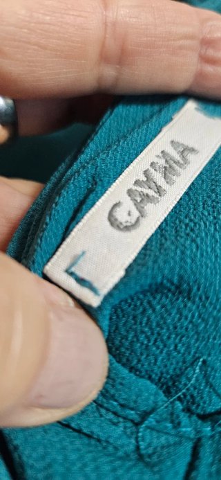 Vestido verde-azulado con lazada