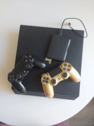 PS4 Pro 1TB SSD + Mandos + hdd 2tb