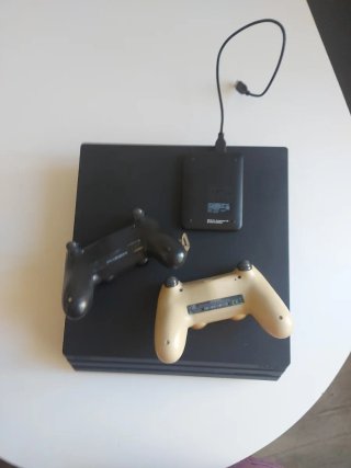 PS4 Pro 1TB SSD + Mandos + hdd 2tb