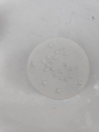 Vela aromática de cerámica blanca