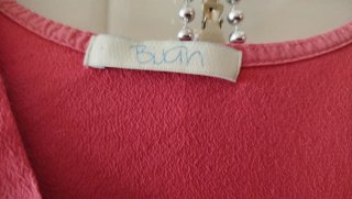 Blusa fucsia sin mangas