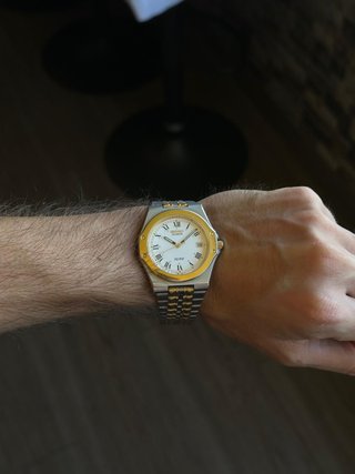 Reloj Seiko SQ100 Oro y Plata