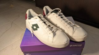 Sneakers Lotto bianche con logo verde scuro