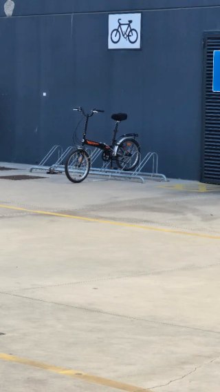 Bicicleta Plegable Negra y Naranja