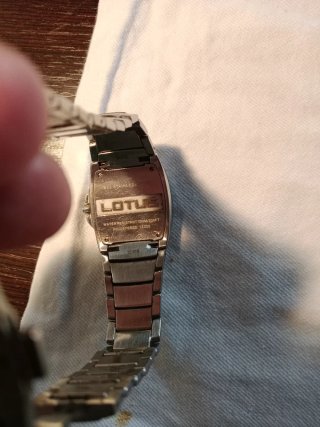 Reloj Lotus Plata y Naranja