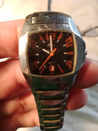 Reloj Lotus Plata y Naranja