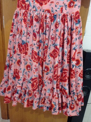 Traje de flamenca rosa y rojo