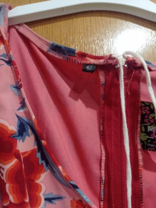 Traje de flamenca rosa y rojo