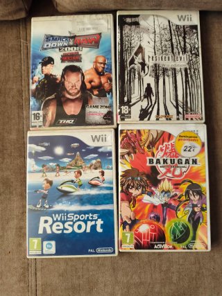 Lote 4 Juegos Wii: WWE, Resident Evil, Wii Sports