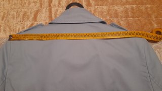 Gabardina Stradivarius azul mujer