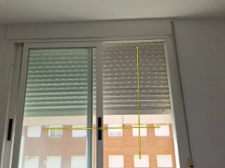 Ventana corredera con persiana